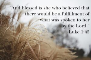 luke 1:45 verse text over wheat background