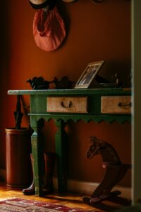 vintage entry table with rocking horse